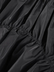 Asymmetrischer gerüschter Minirock