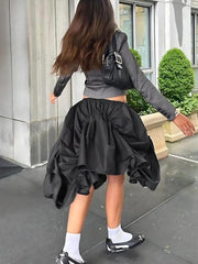 Asymmetrischer gerüschter Minirock