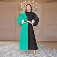 Elegantes, farblich abgestimmtes, hochtailliertes und schwingendes Kleid