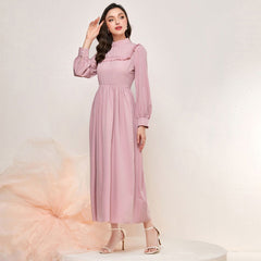 Elegante vestido de cintura alta con borlas y costuras