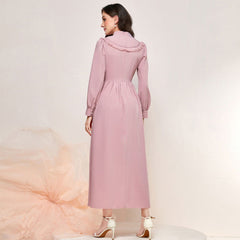 Elegante vestido de cintura alta con borlas y costuras