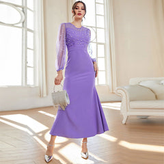 Elegantes Perlenkleid