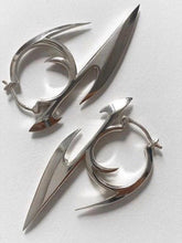 Silver punk character earrings
