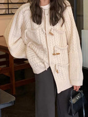 Cárdigan con hebilla de cuerno y diseño retorcido vintage