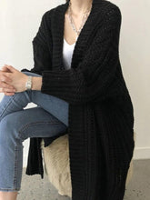 Cárdigan holgado de crochet con aberturas en color liso