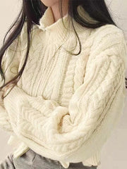 Kurze Strickjacke mit verdrehtem Doppelreißverschluss