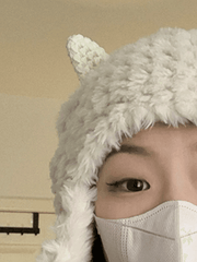 Warme flauschige Trappermütze aus Lammfell