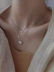 Doppellagige Halskette mit Schmetterlingsanhänger aus Strass