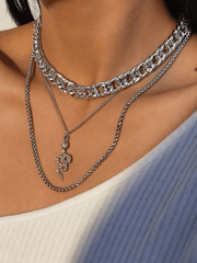 Multilayer necklace with snake decoration