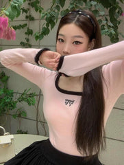 Coquette Top mit flauschigem Halsausschnitt und Schleife