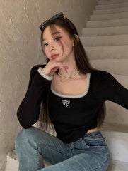 Coquette Top mit flauschigem Halsausschnitt und Schleife