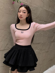 Coquette Top mit flauschigem Halsausschnitt und Schleife