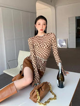 Deformiertes kariertes Top