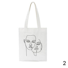 Bolso de hombro con contorno facial