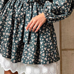 Vestido elegante francés de otoño con mangas abullonadas, cuello alto y estampado floral, corte en A y manga larga ceñida