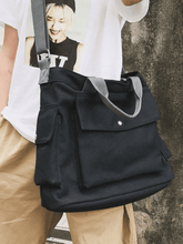 Large canvas shoulder bag with pocket