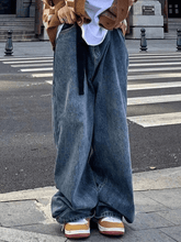 Washed blue belted boyfriend jeans