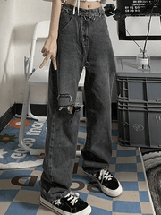 Ausgefranste, zerrissene Jeans im Vintage-Waschungsstil