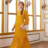 Vestido largo de cuello redondo y mangas farol sueltas