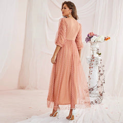 Vestido casual elegante de lunares con cuello redondo