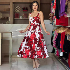 Vestido largo elegante con estampado de rosas rojas y tirantes