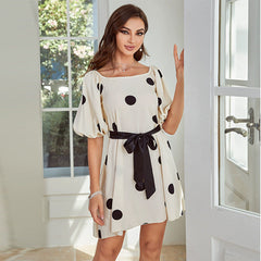 Vestido con mangas abullonadas y lunares de Real Shot