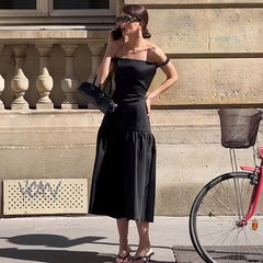 Vestido ajustado con cintura ceñida y top de tubo con hombros descubiertos en color liso