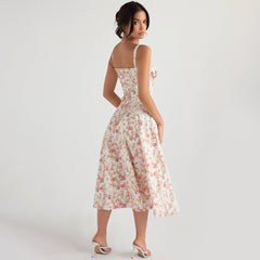 Kleid in schmaler Passform mit Schlitz, Blumenmuster, Cut-outs und rückenfreiem Trägerkleid