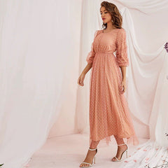 Vestido casual elegante de lunares con cuello redondo