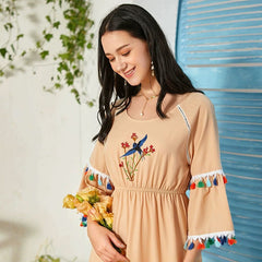 Vestido informal largo de cintura alta con cuello redondo y borlas, media manga