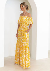Vestido elegante de corte amplio con vuelo, hombros descubiertos y mangas con volantes y estampado floral