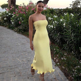 Top de tubo de color sólido sin mangas largo ajustado con ondas grandes