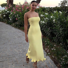 Top de tubo de color sólido sin mangas largo ajustado con ondas grandes