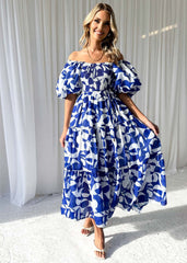 Elegante estampado floral con hombros descubiertos y mangas abullonadas