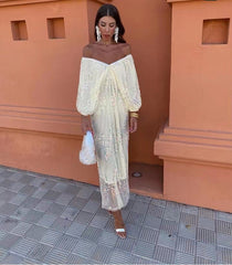 Vestido largo popular con escote en V profundo y lentejuelas y mangas de murciélago