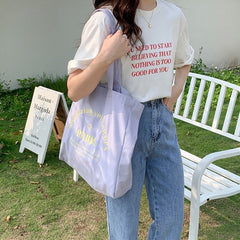 Tasche mit bestickter Paris-Blume