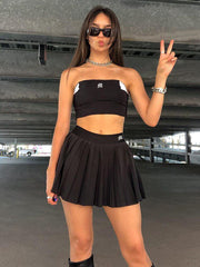 Plissierter schwarzer Mini-Tennisrock