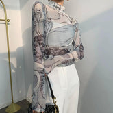 Top de malla Renaissance Heads