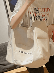 Bolso de mano con bolsillo y estampado de letras
