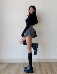 Minifalda universitaria con abertura lateral