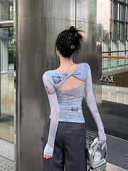 Top fruncido con corte en el cielo