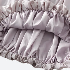 Soft Girl – Pastellfarbener Midirock mit Ballonärmeln