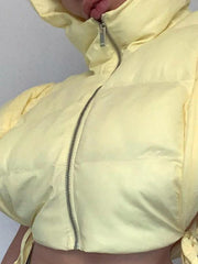 Chaqueta sin mangas con capucha y cordones de color liso