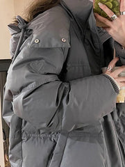 Chaqueta acolchada con capucha y adornos de corazón sólido