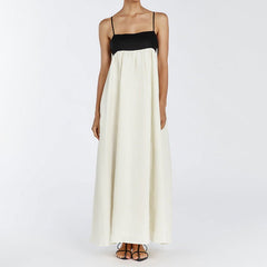 Vestido largo francés sin espalda con tirantes y contraste de color blanco y negro