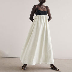 Vestido largo francés sin espalda con tirantes y contraste de color blanco y negro