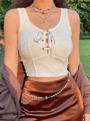 Top corto de encaje con lazo frontal