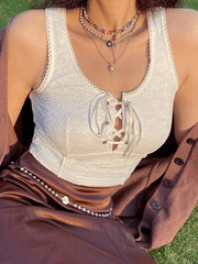 Top corto de encaje con lazo frontal