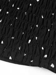 Kurzes Tanktop mit Bindebändern und Herz