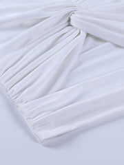 Top corto con corte retorcido